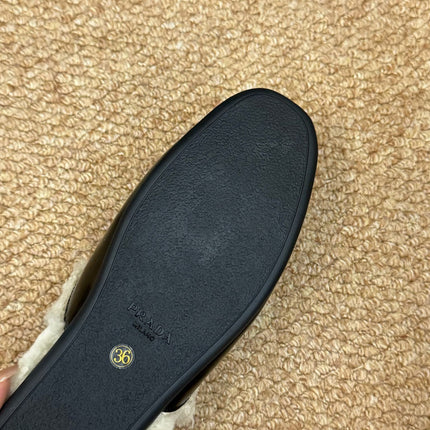 PRADA 26S SHEARLING MULE SLIPPERS IN BLACK CALFSKIN