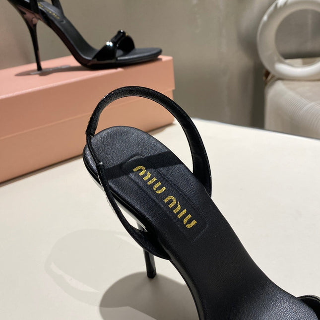 TWO STRAP HIGH HEELED SANDALS IN BLACK GLOSSY SHEEPSKIN