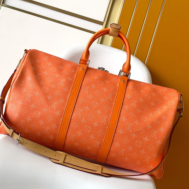 LV 26S KEEPALL 50 IN ORANGE MONOGRAM CANVAS
