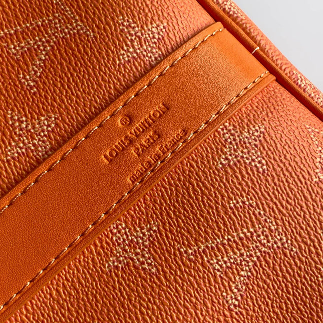 LV 26S KEEPALL 50 IN ORANGE MONOGRAM CANVAS