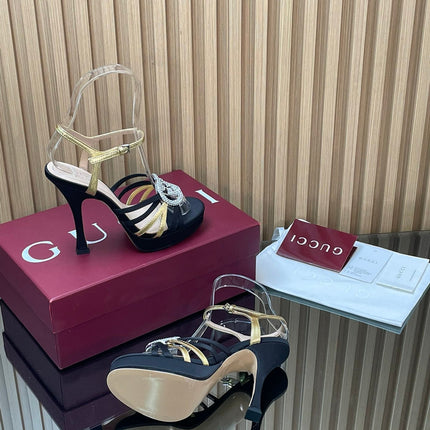 GUCCI 26S HIGH-HEELED SANDALS 125 MM IN BLACK SATIN AND GOLD CALFSKIN