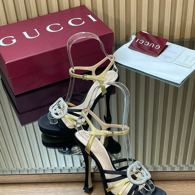 GUCCI 26S HIGH-HEELED SANDALS 125 MM IN BLACK SATIN AND GOLD CALFSKIN