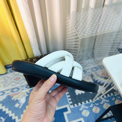 THE ROW 26S CROSSED PADDED SLIDES IN WHITE CALFSKIN