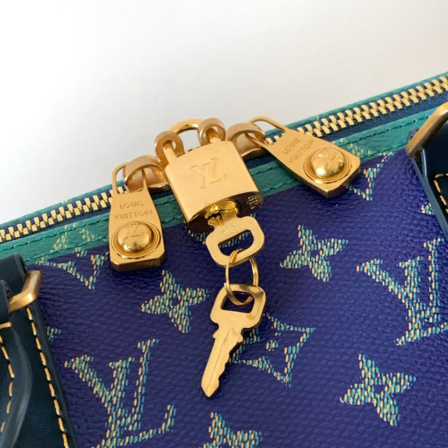 LV 26S KEEPALL 50 IN BLUE WITH LIGHT BLUE ACCENTS COATED CANVAS
