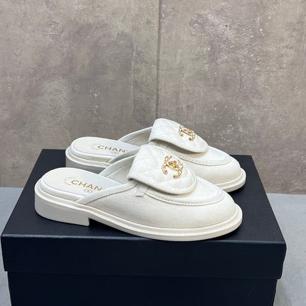 CHANEL 26S MULE LOAFERS IN WHITE CANVAS WITH QUILTED FLAP & CC LOGO