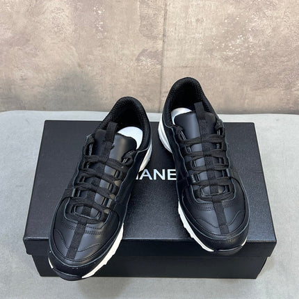 CHANEL 26S RUNNER CC LOGO SNEAKERS IN BLACK CALFSKIN
