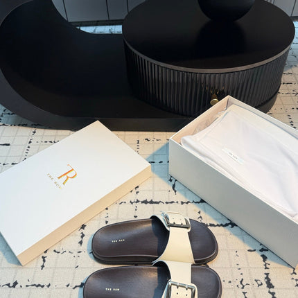 THE ROW 26S BUCKLE SLIDE SANDALS IN WHITE CALFSKIN