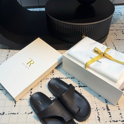 THE ROW 26S THONG SLIDE SANDALS IN BLACK CALFSKIN