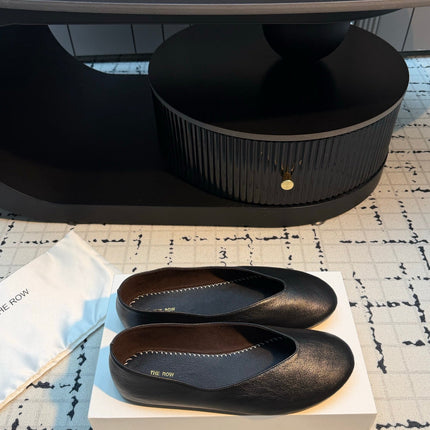 THE ROW 26S CLASSIC BALLET FLATS IN BLACK CALFSKIN