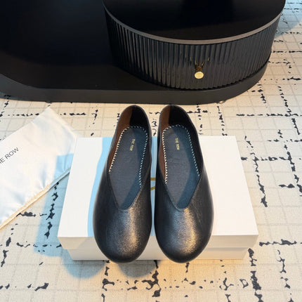 THE ROW 26S CLASSIC BALLET FLATS IN BLACK CALFSKIN