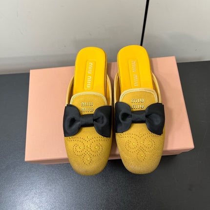 BOW MULES IN DUST YELLOW SUEDE