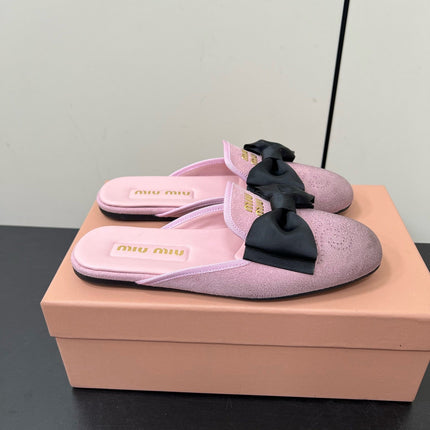 BOW MULES IN DUST PINK SUEDE