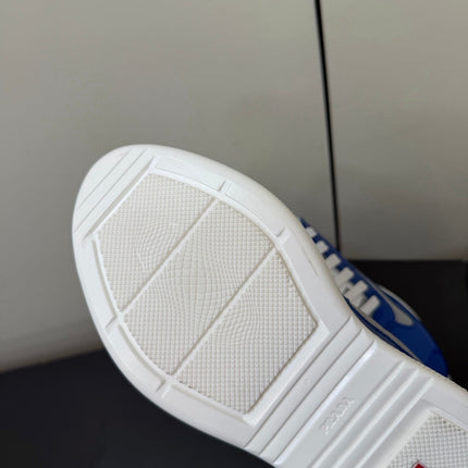 PRADA 26S SNEAKERS IN DARK BLUE PATENT CALFSKIN AND WHITE MESH