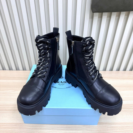 PRADA 25S MONOLITH BOOTS IN BLACK CALFSKIN