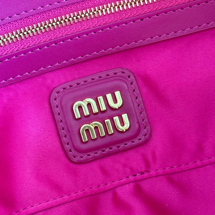 ARCADIE BAG 27 IN FUCHSIA SUEDE GOLD HARDWARE