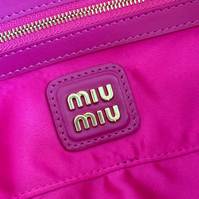 ARCADIE BAG 27 IN FUCHSIA SUEDE GOLD HARDWARE