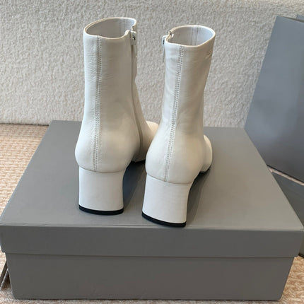 ANKLE BOOTS IN WHITE LOGO EMBOSSED SOFT SHEEPSKIN