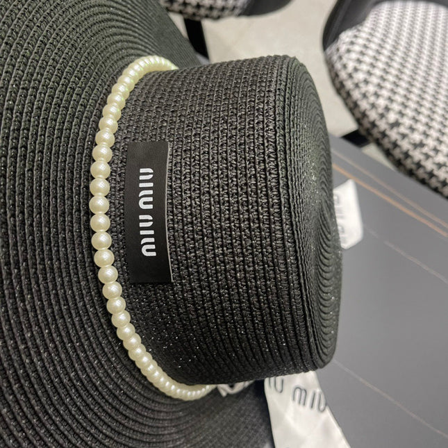MIUMIU SMALL-BRIM STRAW HAT IN BLACK AND PEARL EMBELLISHED