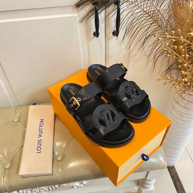 LV 26S ISOLA COMFORT MULES IN BLACK CALFSKIN