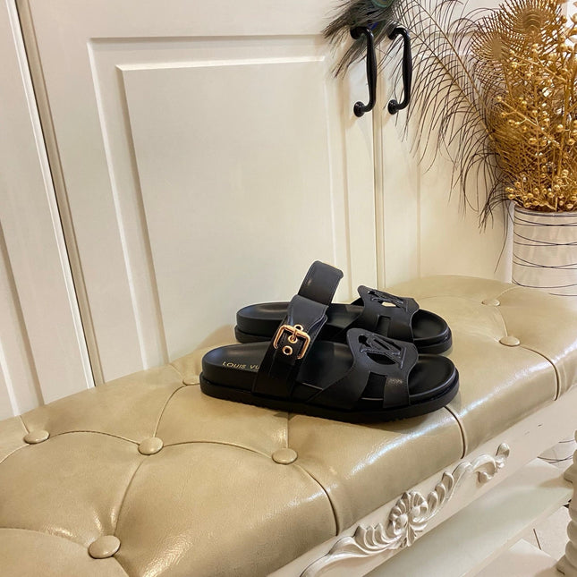 LV 26S ISOLA COMFORT MULES IN BLACK CALFSKIN