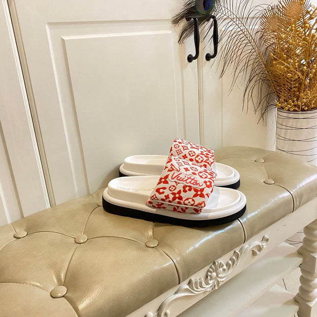 LV 26S PILLOW COMFORT MULES IN WHITE AND ORANGE CANVAS