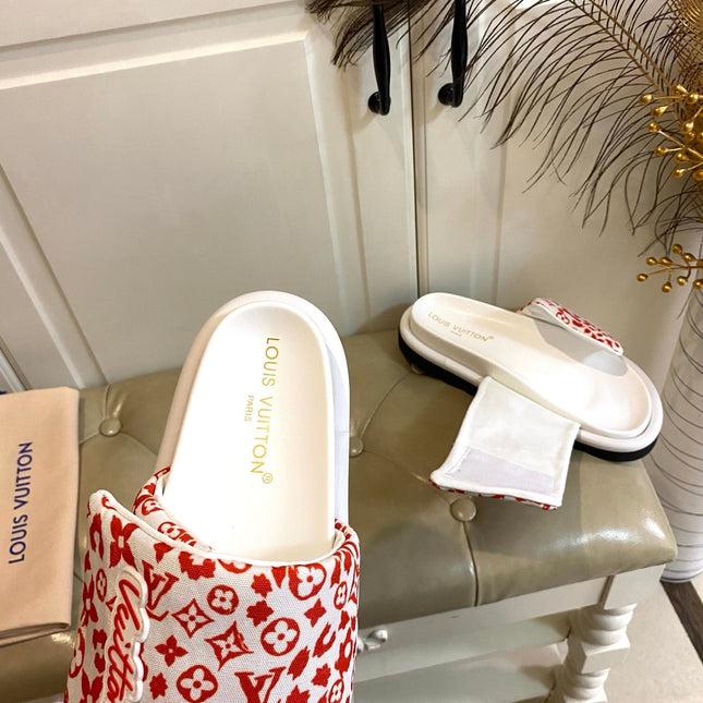 LV 26S PILLOW COMFORT MULES IN WHITE AND ORANGE CANVAS