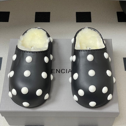 BALENCIAGA 25S FUR-LINED MULES IN BLACK AND WHITE FAUX LEATHER