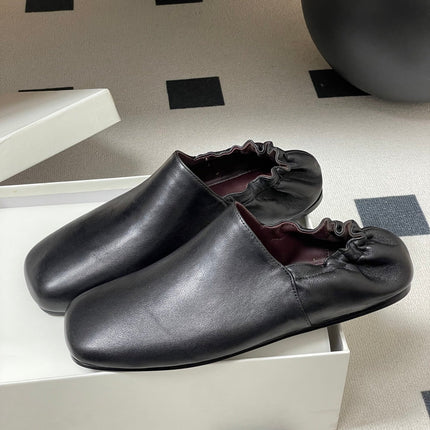 CELINE 26S ELASTIC-BACK FLAT SHOES IN BLACK LAMBSKIN