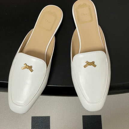 DIOR 26S MULES IN WHITE CALFSKIN WITH BOW