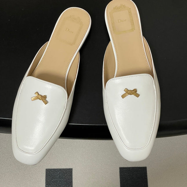 DIOR 26S MULES IN WHITE CALFSKIN WITH BOW