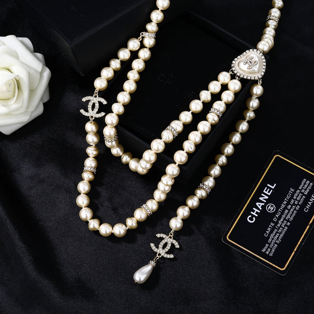 CHANEL 25S CHAIN BELT IN WHITE PEARL 614476