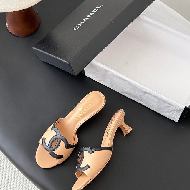CHANEL MULES IN BEIGE AND BLACK CALFSKIN