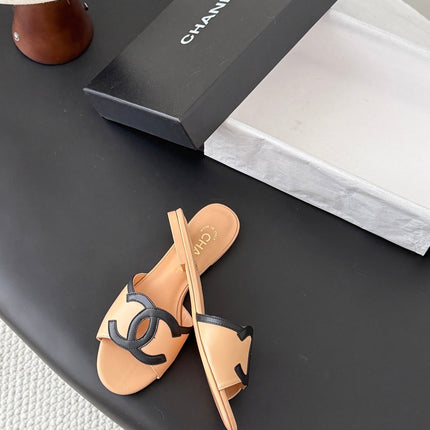 CHANEL MULES IN BEIGE MIX BLACK CALFSKIN