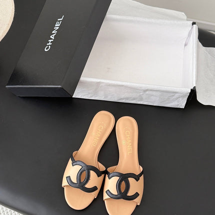 CHANEL MULES IN BEIGE MIX BLACK CALFSKIN