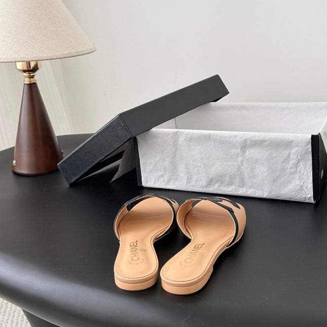 CHANEL MULES IN BEIGE MIX BLACK CALFSKIN