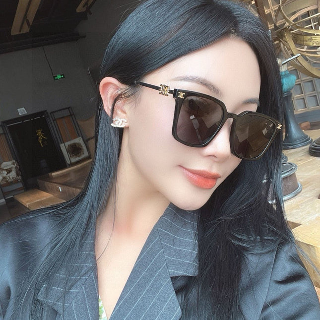 TRIOMPHE SUNGLASS 497820 IN GOLD METAL BLACK LENSES