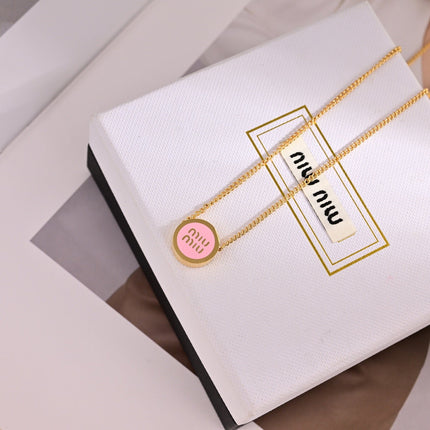 MIUMIU 26S ROUND LOGO PENDANT NECKLACE IN PINK ENAMEL AND GOLD TONE METAL 630864