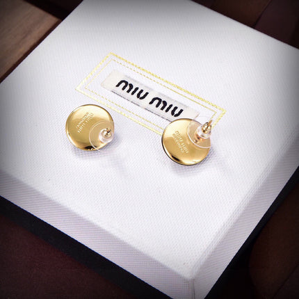 MIUMIU 26S ROUND CRYSTAL STUD EARRINGS IN BLACK RESIN AND GOLD TONE METAL 633262