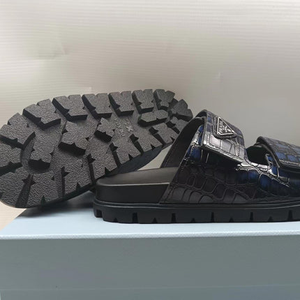 PRADA 26S STRAP SLIDES IN BLACK CROC EMBOSSED CALFSKIN