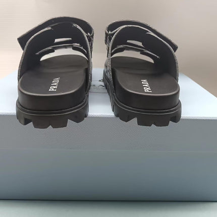 PRADA 26S STRAP SLIDES IN BLACK CROC EMBOSSED CALFSKIN