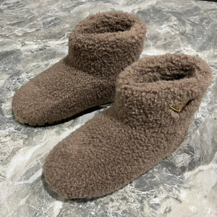 PRADA 26S ANKLE BOOTS IN DARK BROWN FUR