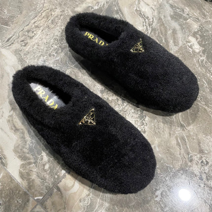 PRADA 26S SLIPPERS IN BLACK WOOL
