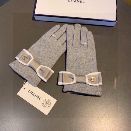 CC GLOVES IN PALE GRAY WOOL WITH BOW 463856