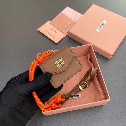 MICRO BAG 7 IN TAWNY BROWN SMOOTH LAMBSKIN ORANGE STRAP