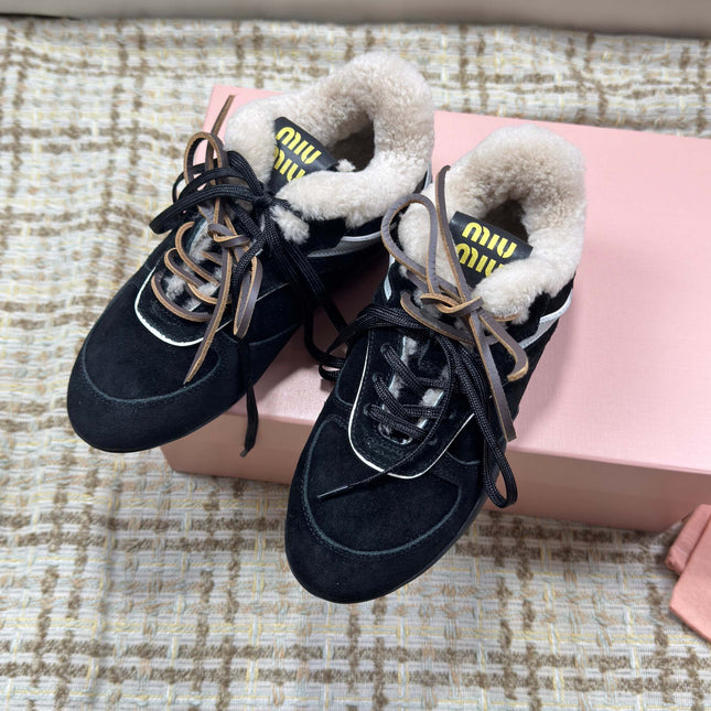 MIUMIU 26S SNEAKERS IN BLACK SUEDE AND SHEARLING