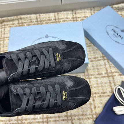 PRADA 26S LOW TOP SNEAKERS IN BLACK NYLON AND SUEDE