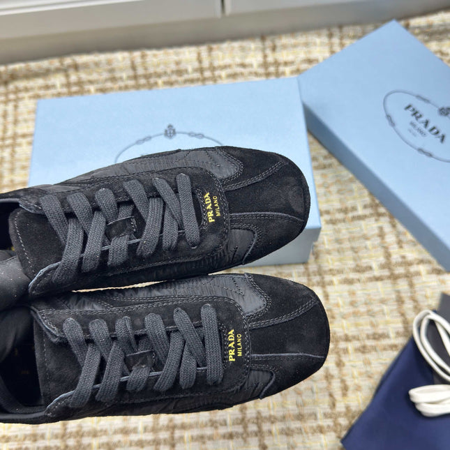 PRADA 26S LOW TOP SNEAKERS IN BLACK NYLON AND SUEDE