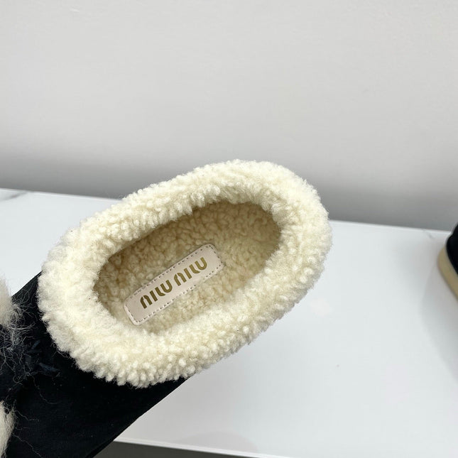 MIUMIU 26S ANKLE SHEARLING BOOTS IN BLACK SUEDE