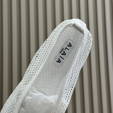 ALAIA FISHNET MESH BALLET FLATS 25S IN WHITE FABRIC