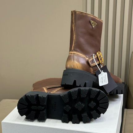 PRADA 25S PLATFORM ANKLE BOOTS IN DARK BROWN CALFSKIN WITH GOLD HARDWARE